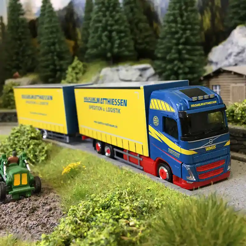 Semi-remorque tandem, bâche à rideau jumbo, Volvo FH GL 2020, Wolfgang Matthiessen - HERPA 319515 - HO 1/87 Nouvel Arrivage