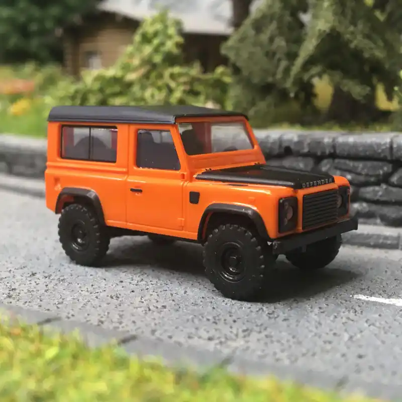 Land Rover Defender 90, dernière édition, Orange - BUSCH 54309 - HO 1/87 Bon Plan